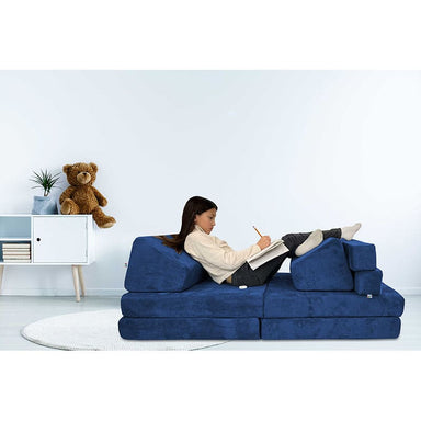 foam_kids_couch_navy_blue_girl_doing_homework