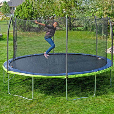 15' x 13' Skywalker Oval Trampoline with Net - Dual Color with girl jumping