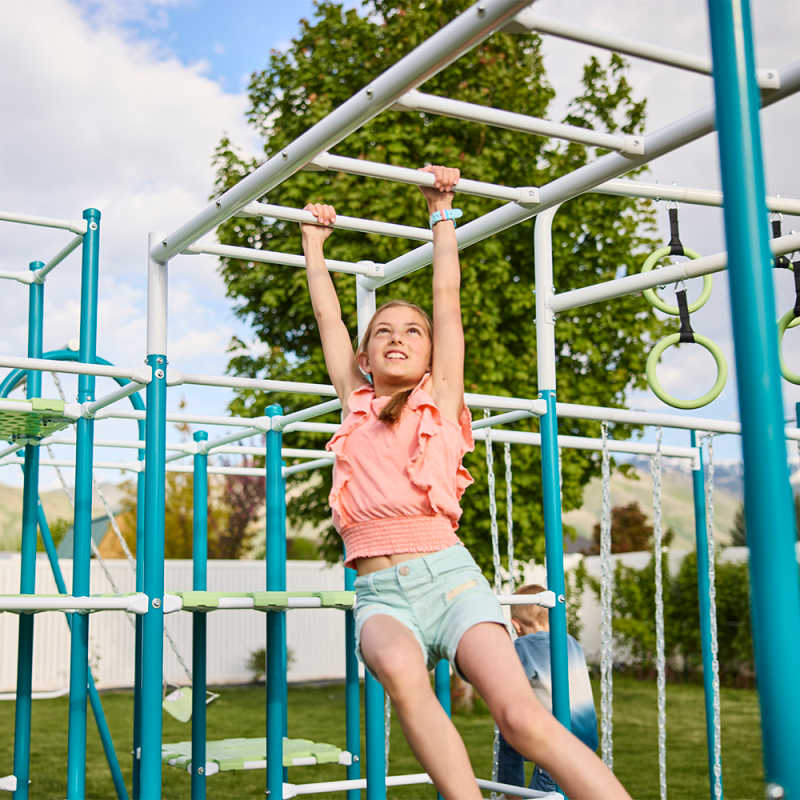 ActivPlay jungle gym with monkey bars and girl climbing