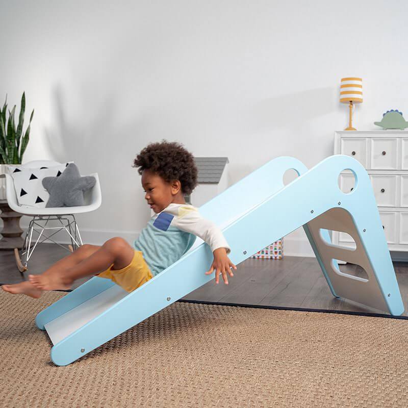 Avenlur Manuka - Indoor Slide Side View Kid On Blue Slide