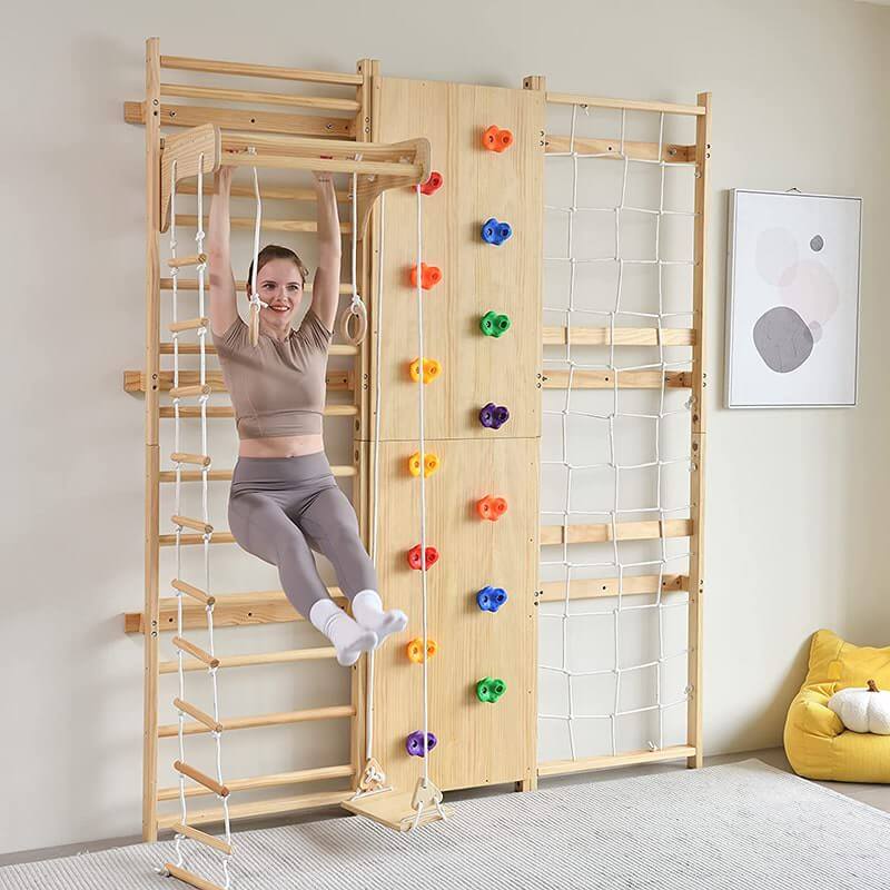 Avenlur Walnut - 9-in-1 Swedish Ladder Wall Gym Set Showing A Woman Doing Pull Ups