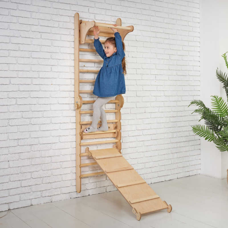 Goodevas 5 in 1: Wooden Swedish Wall Bar Set for Children with a girl climbing