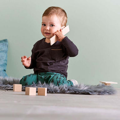HABA USA Clever Up! Building Block System 1.0 Kid Playing It Like A Phone
