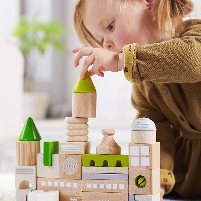 HABA USA Coburg 28 Piece Wooden Building Blocks Little Girl Constructing A Castle