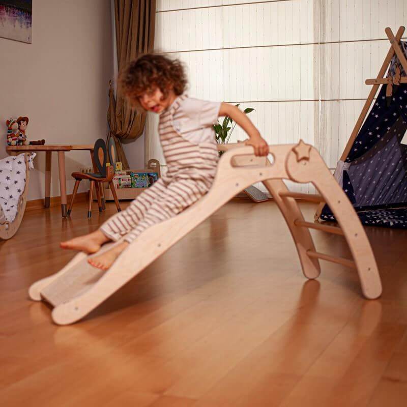 Kidodido Foldable Wooden Slide Side View With A Kid Sliding