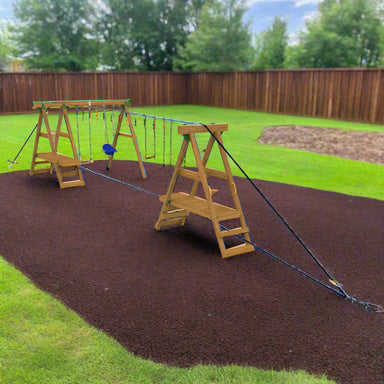 Ninja playset in a yard on rubber playground mulch