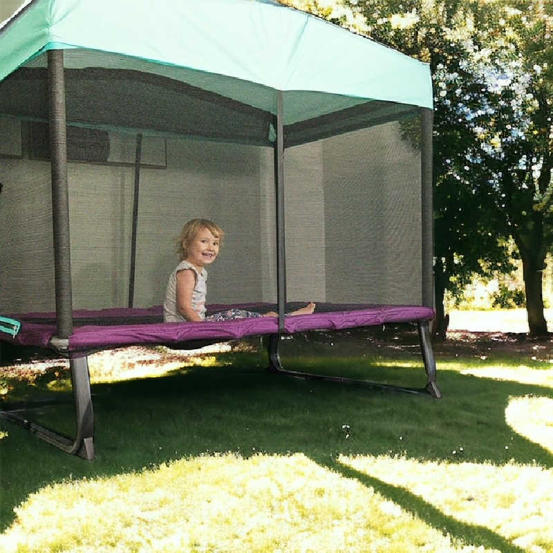 Skywalker Mini Trampoline with girl playing outside