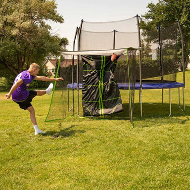 Skywalker Sports Multi Sport Training Net game accessory for Trampolines with Boy practicing football