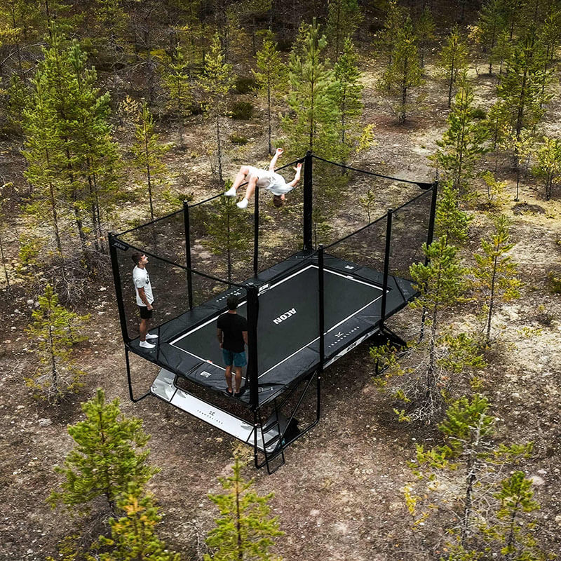 acon_x_rectangular_trampoline_with_net_package_trickers_in_pine_woods