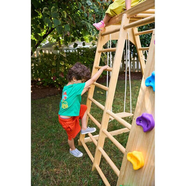 magnolia_outdoor_and_indoor_real_wood_7_in_1_playset_boy_climbing