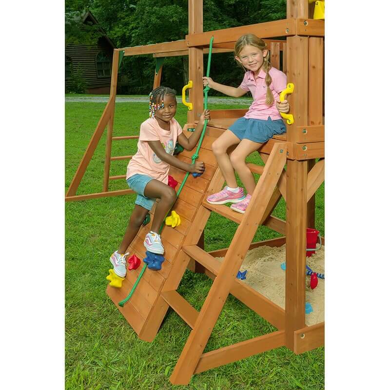 rock climbing wall with kids playing
