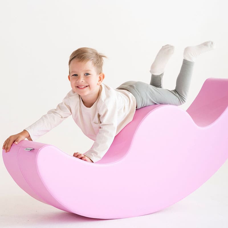 Soft Play rocker in light pink with boy playing