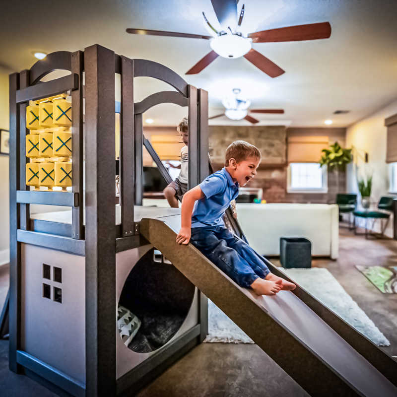 KidsQuest Trailblazer indoor and outdoor playset with kids playing