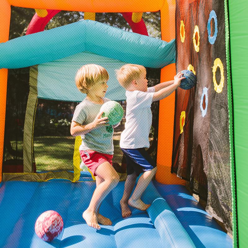 2-kid-playing-in-the-kid-wise-double-shot-bounce-house