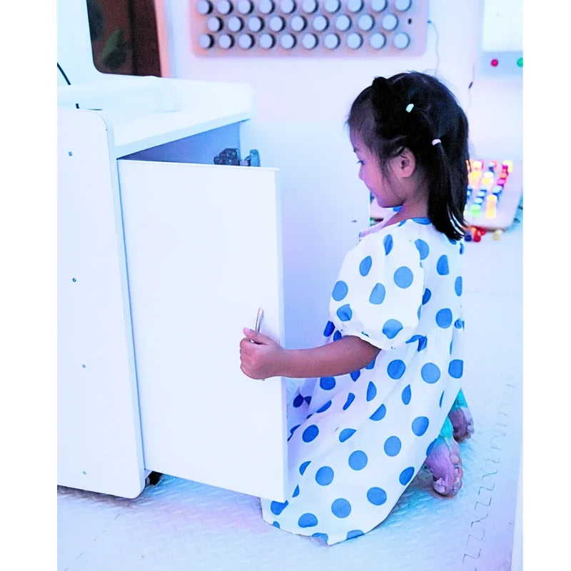 4ft Mobile Sensory Room with Projector - child beside the cart storage doors