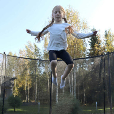 ACON Air 15ft GEN 2.0 Round Trampoline with a girl jumping 