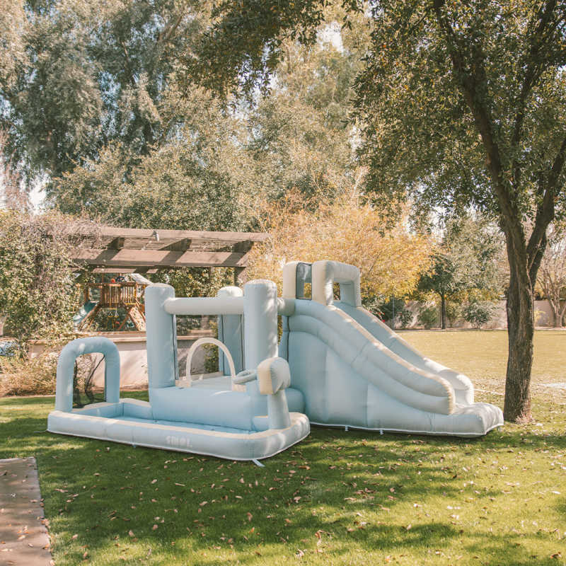 All-Star Sports Arena Bounce House in a backyard
