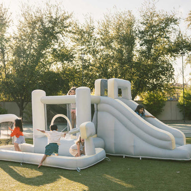 All-Star Sports Arena Bounce House in a yard with kids