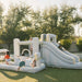 All-Star Sports Arena Bounce House in a yard with kids