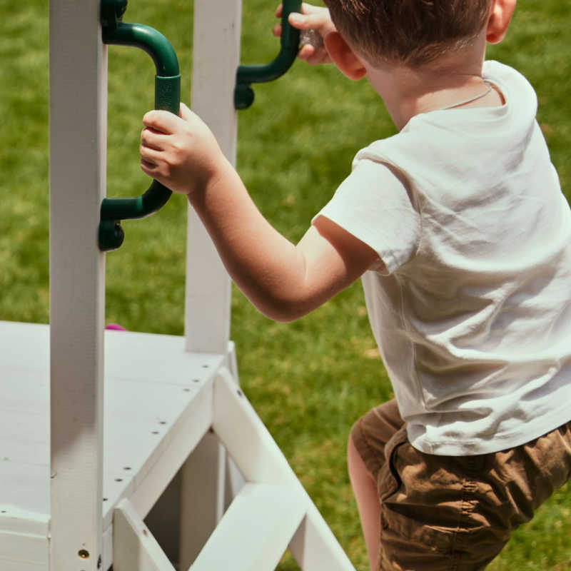 Aloe Outdoor Mini Playset with water fund with boy climbing steps