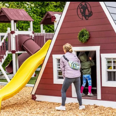 Vinyl Playhouse with slide and kids playing