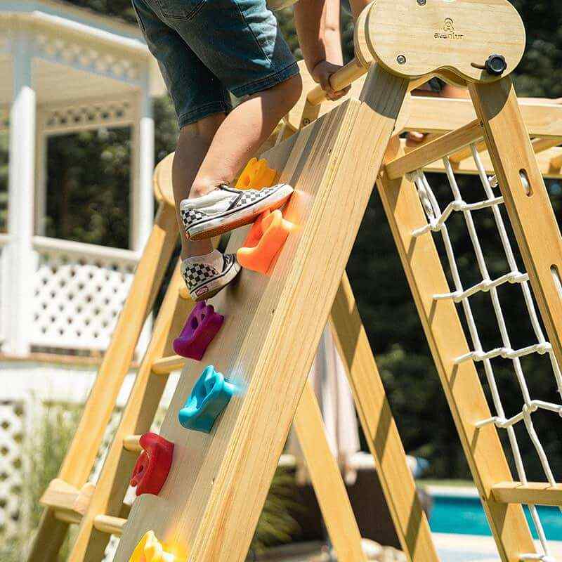 Chestnut 8-in-1 Indoor Jungle Gym rock wall close up