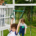 Avenlur Craftsman - Modern Backyard Outdoor Swing Set Showing A Kid Playing Trapeze Bar