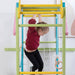 Avenlur Grove - Indoor Jungle Gym Colorful Front View Close Up A Kid On Monkey Bar
