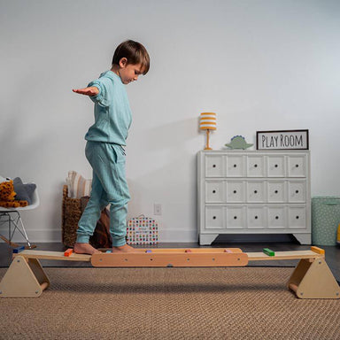 Avenlur Willow- Rainbow Seesaw and Balance Beam  Side View Showing A Kid Balancing