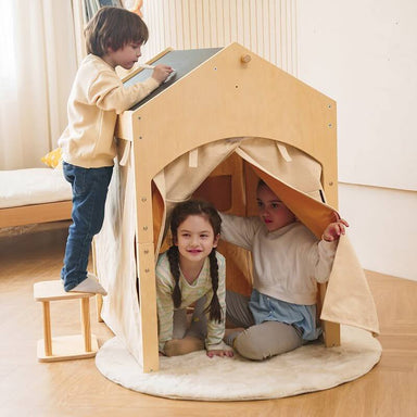 Avenlur Wood Adjustable Learning Indoor Tent with Desk and Chair - Ash A Boy Standing And Writing While Two Girls Inside The Tent