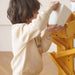 Avenlur Outdoor Wooden Water Table For Kids Toddlers Showing A Kid Pouring Water On Side