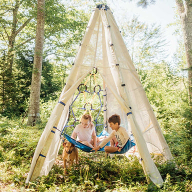 Bijou Build Mainstay outdoor teepee with kid playing in the woods