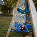 Bijou Monkey Business – child and dog beside backyard playset