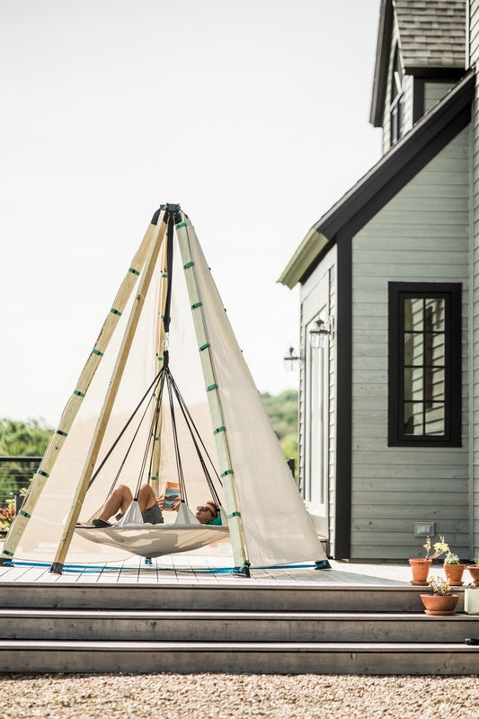 Bijou Nest with Guy relaxinG on a deck