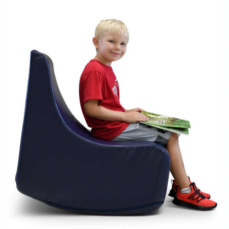 Boy rocking in the BouncyBand Rocking Soft Sensory Chair