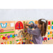 Sensory play wall with a girl playing 
