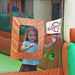 close-up-of-a-girl-in-the-window-of-kid-wise-clubhouse-climber-bounce-house