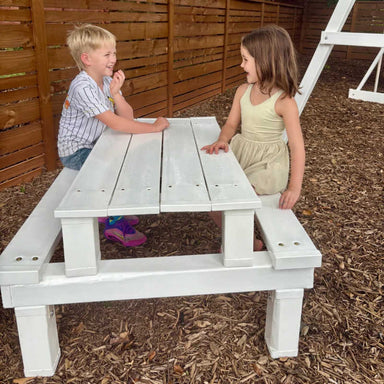 Kids Picnic Table with kids playing 