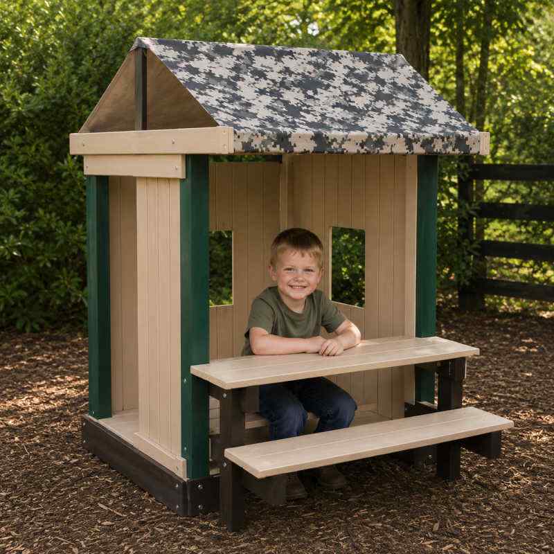 COngo Clubhouse with a camo roof with a boy playing