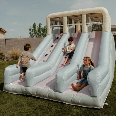 Double Slide Kids Inflatable with kids playing 
