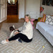 Eeveve Modern Blocks - Play Mat in Desert Sand with a mom and kid 