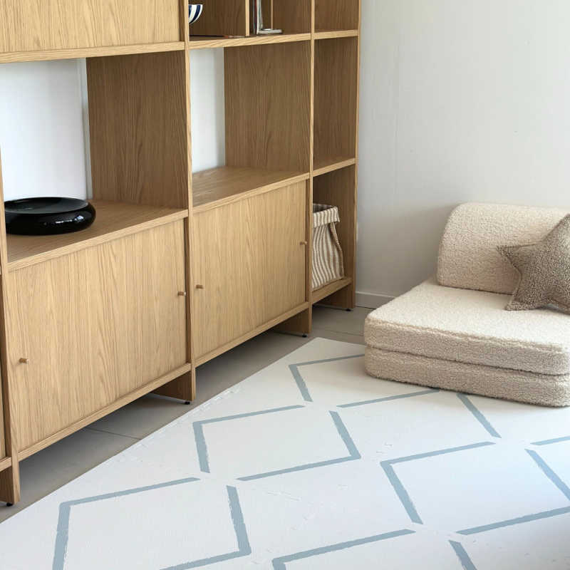 Eeveve Beni Powder Blue Play Mat in a living room