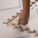 Eeveve Beni Powder Blue Play Mat with woman showing depth