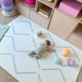 Eeveve Beni Powder Blue Childrens Play Mat with baby laying on it
