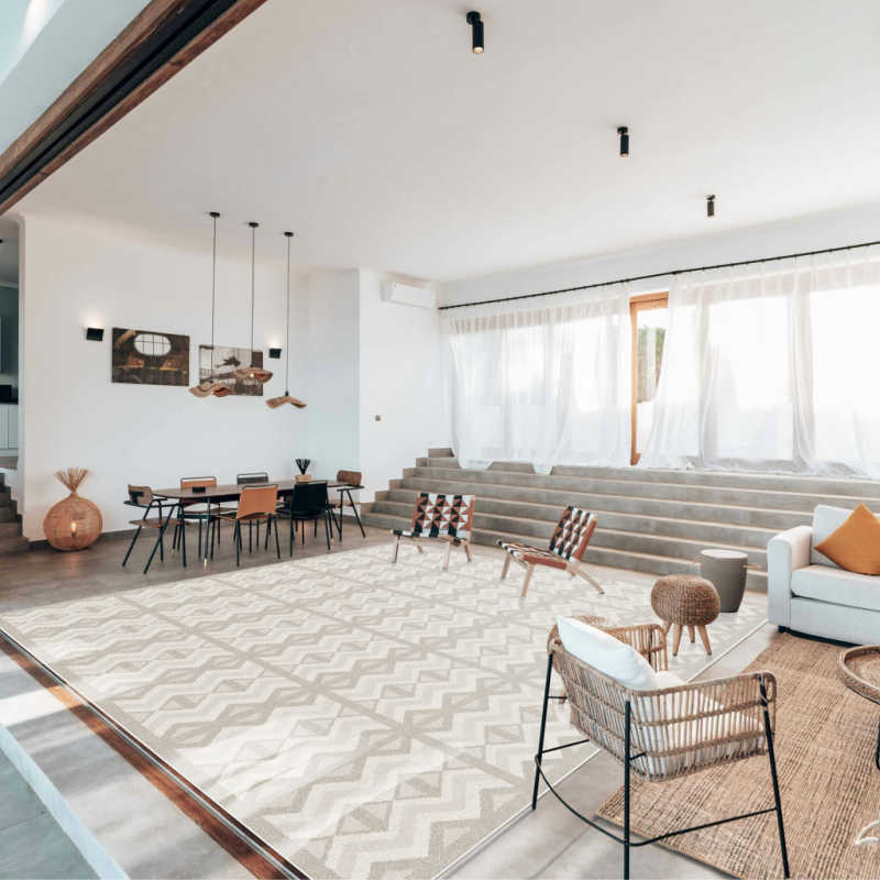 Eeveve Kilim Feather Gray Children's Play Mat in a living room