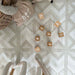 Eeveve Kilim Feather Gray Play Mat top view with blocks