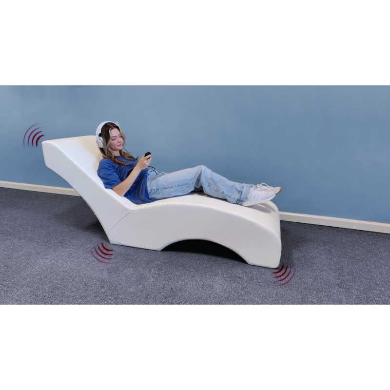 vibroacoustic lounger with a girl listening on headphones