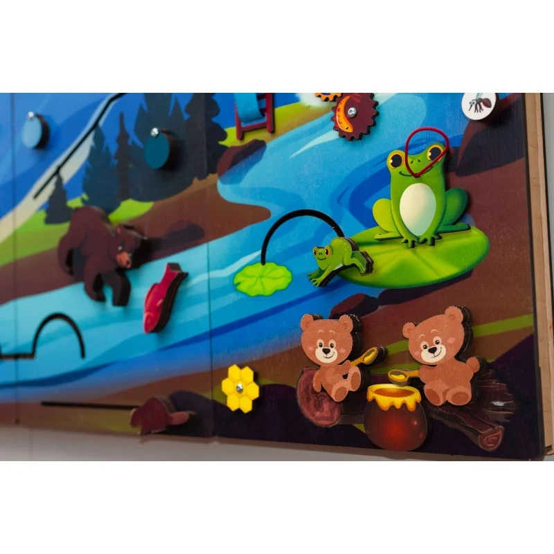 Extra Large Mountain Themed Busy board in a sensory room with frogs and bears. 