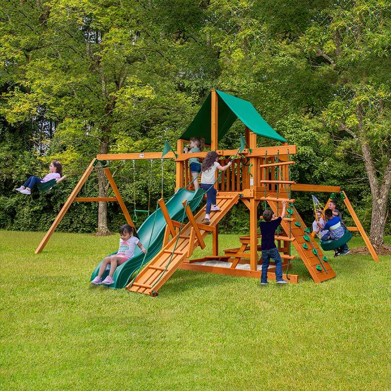 Gorilla Playsets Frontier Swing Set Deluxe Green Vinyl Canopy Corner View With Kids Playing Outdoor