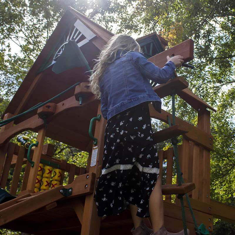 Gorilla Playsets Frontier Swing Set Showing Kid Climbing Rope Ladder